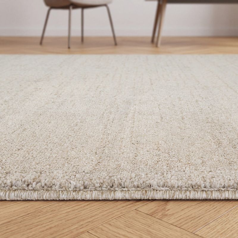 Nobu Beige – Runder Teppich in Wolloptik