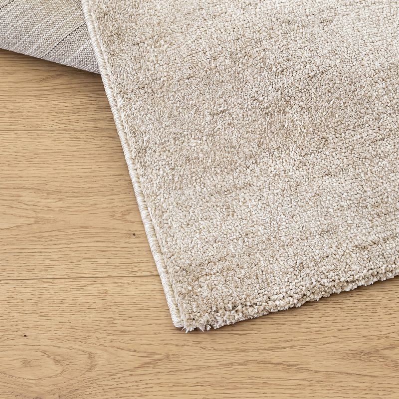 Nobu Beige – Runder Teppich in Wolloptik
