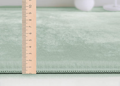 Focus kuschelig warmer Fellteppich 47 40-Green