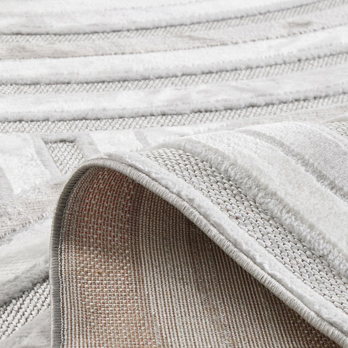 Loopin 312 Grau – In- & Outdoor Teppich mit Bogenmuster